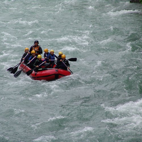 Hiking in Sterzing and the surrounding area Group rafting on white water river with strong currents